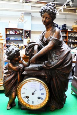 Lot 297 - An Aesthetic movement mantel clock in ebonized...