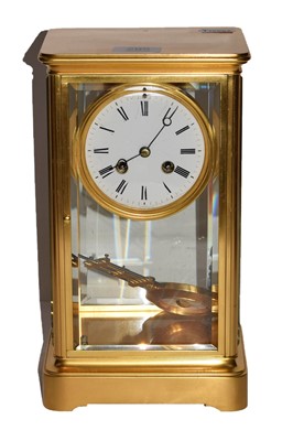 Lot 295 - A brass cased four glass striking mantel clock...