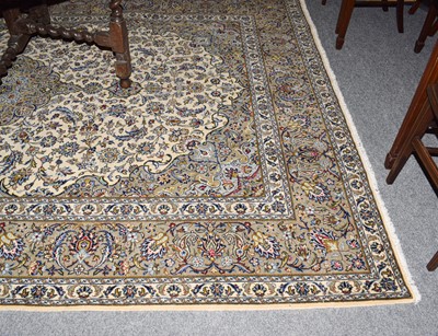 Lot 1019 - Kashan Carpet, The ivory field of vines around...