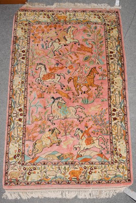 Lot 1010 - An Indian rug the candy pink field with...