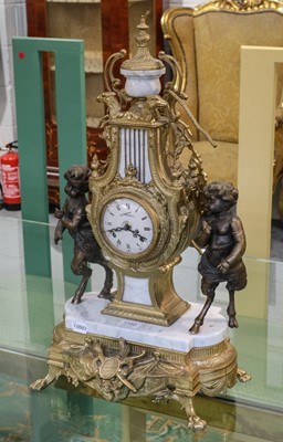 Lot 1180 - A reproduction gilt metal and grey marble...