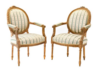 Lot 370 - {} A Pair of Louis XV Style Carved Giltwood...