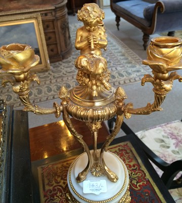 Lot 143 - {} A Pair of French Gilt Metal and White...