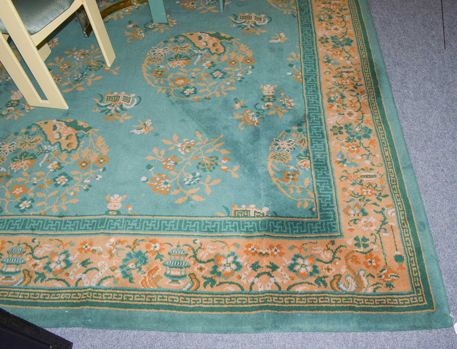 Lot 1234 - A machine made carpet of Chinese design,