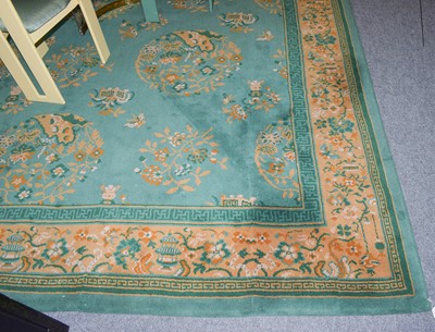 Lot 1234 - A machine made carpet of Chinese design, the...