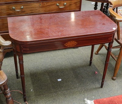 Lot 1310 - A Regency mahogany foldover tea table, of...