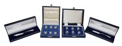 Lot 225 - A case set of six silver place card holders...