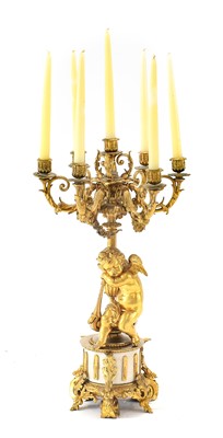 Lot 141 - {} A French Gilt Metal Seven-Light Figural...