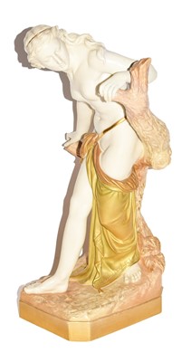 Lot 254 - A Royal Worcester blushware figure of a maiden...