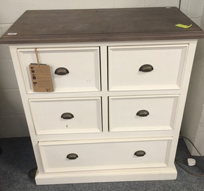 Lot 1159 - A modern cream painted chest of three drawers...