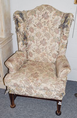 Lot 1158 - A 19th-century wing back armchair (a.f)