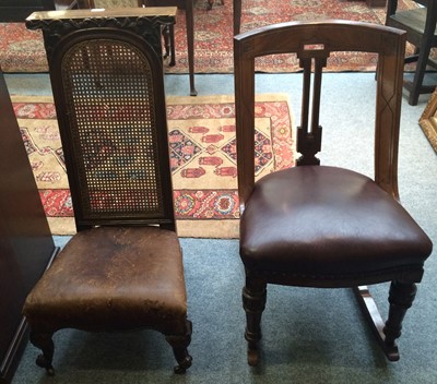 Lot 1165 - A mahogany rocking chair and a mahogany caned...