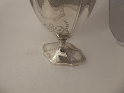Lot 2297 - {} A George III Silver Hot-Water Jug