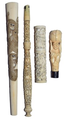 Lot 240 - A Japanese Meiji period carved ivory parasol...