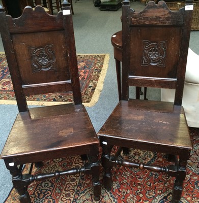 Lot 1173 - A pair of 17th century style carved oak...