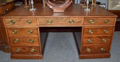 Lot 1232 - An early 19th century mahogany partner's desk...