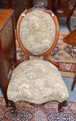 Lot 1151 - A Victorian rosewood nursing chair and a...