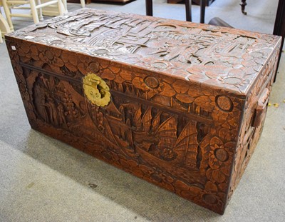 Lot 1273 - A 20th century carved camphor wood chest...