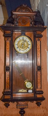 Lot 1299 - A Vienna type inlaid striking wall clock