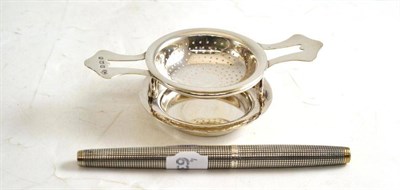 Lot 3 - A silver Elkington & Co strainer, numbers 26091; and a sterling silver Parker pen with nib...