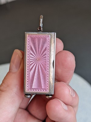Lot 249 - A miniature silver plated and pink enamel...