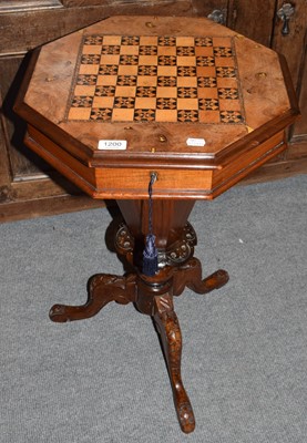 Lot 1200 - A Victorian inlaid walnut work table with game...