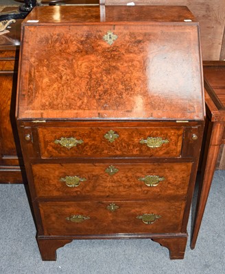 Lot 1217 - A 19th century crossbanded burr walnut bureau...