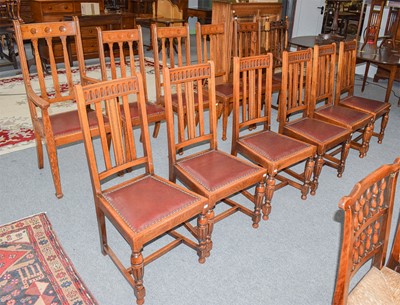 Lot 1238 - A set of six early 20th century oak dining...