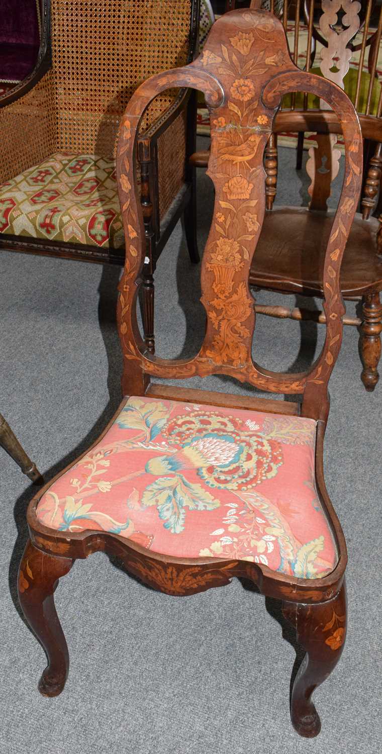 Lot 1243 - A 19th century Dutch marquetry chair, (AF)