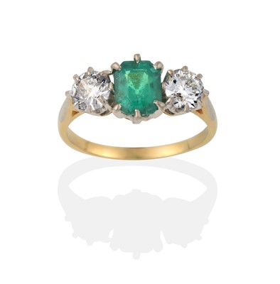 Lot 2031 - An Emerald and Diamond Three Stone Ring