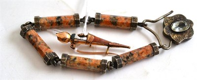 Lot 18 - A hardstone set bracelet, lock stamped 'RETTIE & SONS ABERDEEN', and a dirk brooch