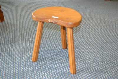 Lot 965 - A Robert  "Mouseman " Thompson Oak Cow Stool, on three octagonal legs, with carved mouse signature