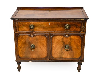 Lot 1240 - A Regency Style Mahogany Harlequin Desk, the...