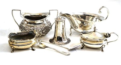 Lot 23 - A small quantity of silver including a sauce boat, salt, pepperette, sugar, mustard, spoon