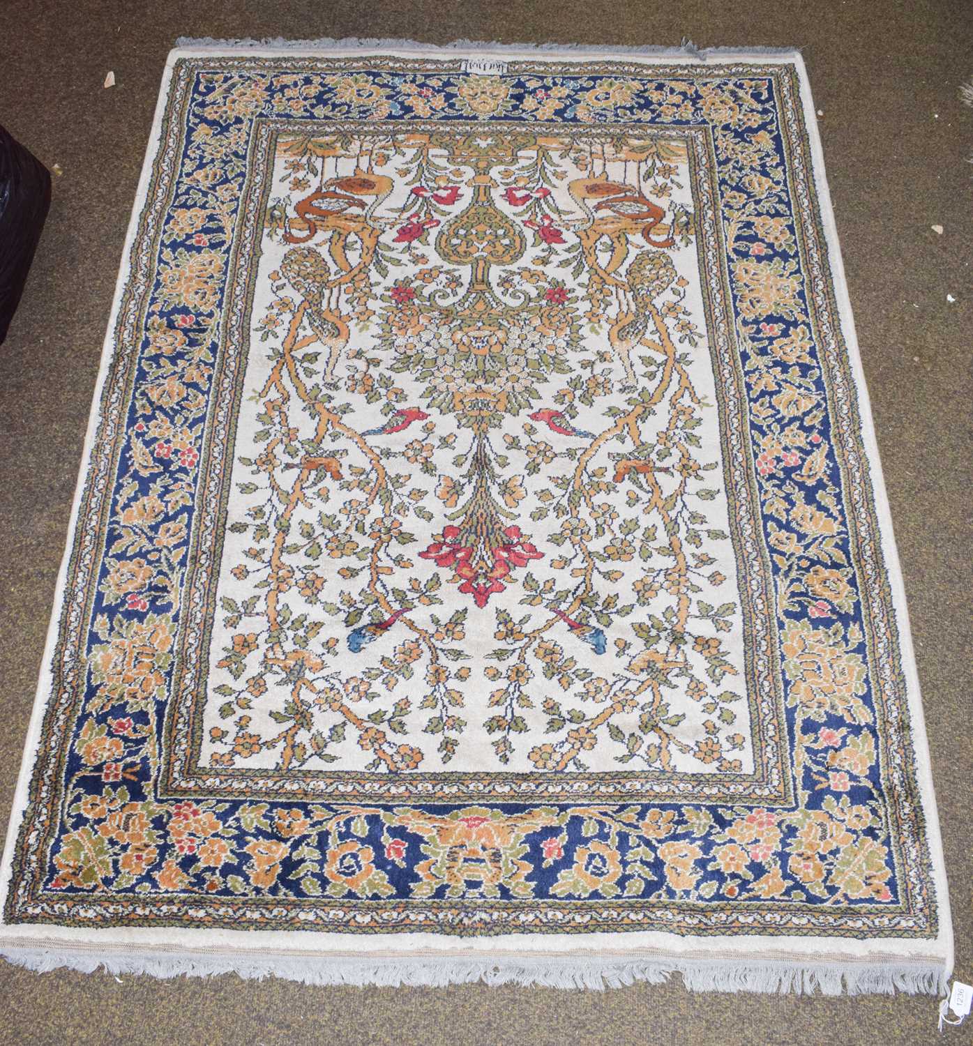 Assyrian Rugs Lot 1225 - A machine made rug of Iranian prayer design,