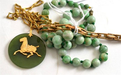 Lot 34 - An expanding watch bracelet, a jade bead necklace and a pendant on chain