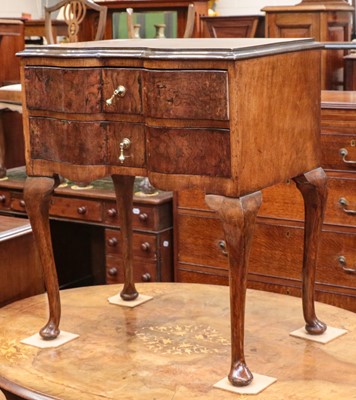 Lot 1311 - An early 20th century figured walnut...