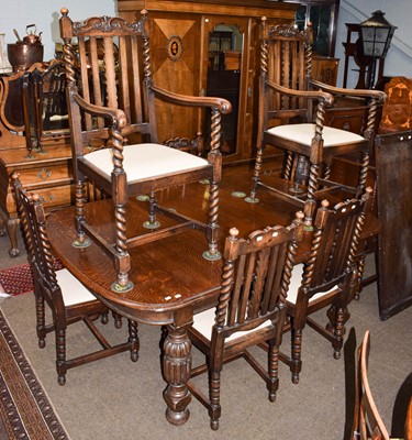 Lot 1273 - A 1920's/30's oak dining room suite,...