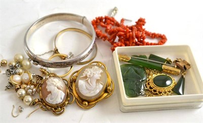 Lot 39 - Two cameo brooches, a coral necklace, assorted costume jewellery and silver jewellery