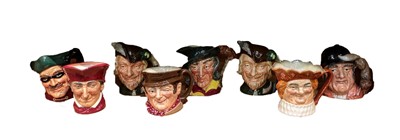 Lot 57 - Eight Royal Doulton large character jugs, to...