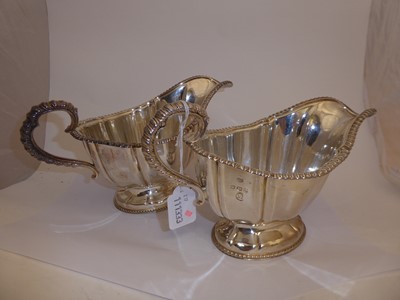 Lot 205 - A Pair of Elizabeth II Silver Sauceboats, by...