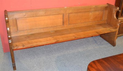 Lot 969 - A Robert  "Mouseman " Thompson 6'6 " Oak Pew, with panelled back and shaped ends, each with...