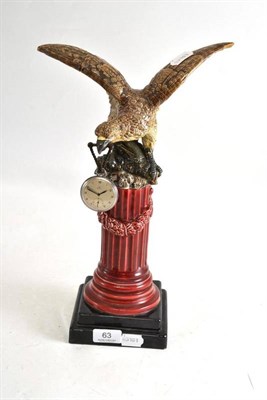 Lot 63 - Eagle watch stand and watch