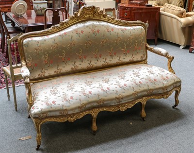 Lot 1189 - A Louis XV style giltwood parlour settee with...