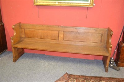 Lot 970 - A Robert  "Mouseman " Thompson 6'6 " Oak Pew, with panelled back and shaped ends, each with...