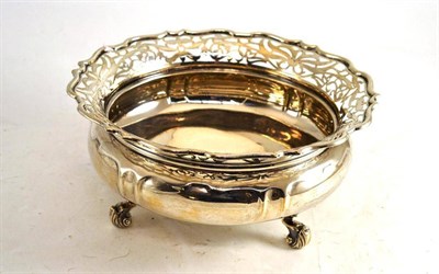 Lot 74 - Silver bowl with pierced rim on three feet (marks rubbed)