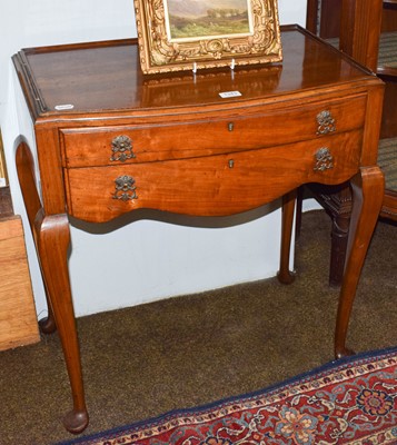 Lot 1343 - An EPNS cutlery service in walnut side table...