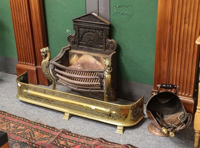 Lot 1141 - A brass and iron basket grate, antique fire...