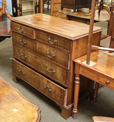 Lot 1316 - A George III mahogany chest of two short and...