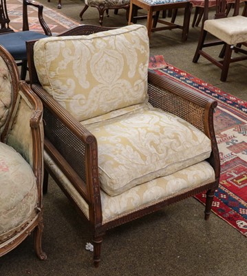 Lot 1301 - A 19th century carved mahogany bergere armchair